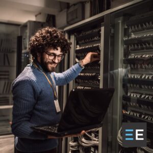 A person working on a computer server