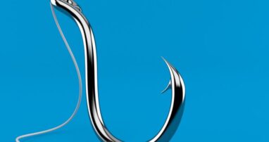 A fishing hook on a blue background