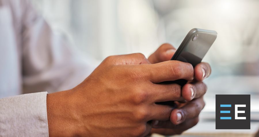 A person typing on their phone