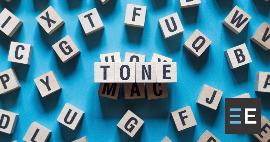 Scattered blocks with letters on them. Above the rest are blocks that spell the word tone