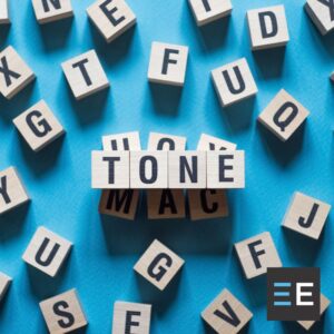 Scattered blocks with letters on them. Above the rest are blocks that spell the word tone
